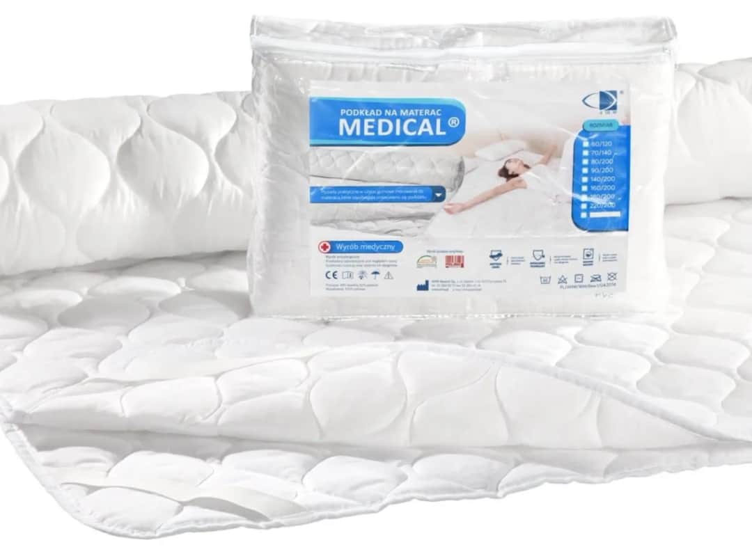 Jaki ochraniacz na materac wybrać, aby uniknąć alergii i plam?